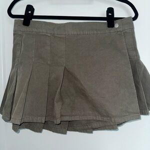 Khaki pleated mini skirt